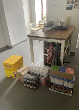 Kitchen at Xfive office in Krakow with suplies prepared for refugees.